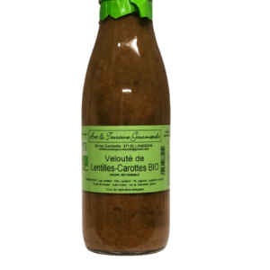 Description d'une photo d'une bouteille de "Velouté de Lentilles-Carottes Bio" en verre de 75cl.